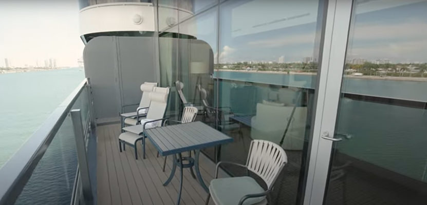 a table and chairs on a boat